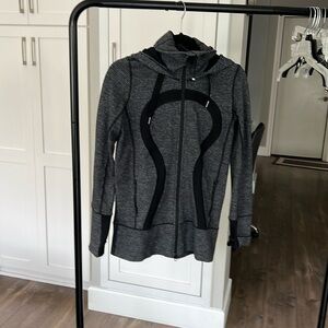 Lululemon Athletica sweater with hood.  Excellent condition size 6.